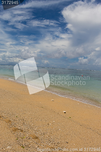 Image of Beautiful tropical beach with lush vegetation