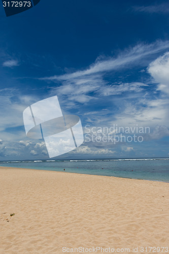 Image of Beautiful tropical beach with lush vegetation