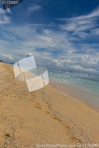 Image of Beautiful tropical beach with lush vegetation