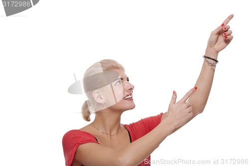 Image of Happy Blond Woman Pointing Up with Both Hands
