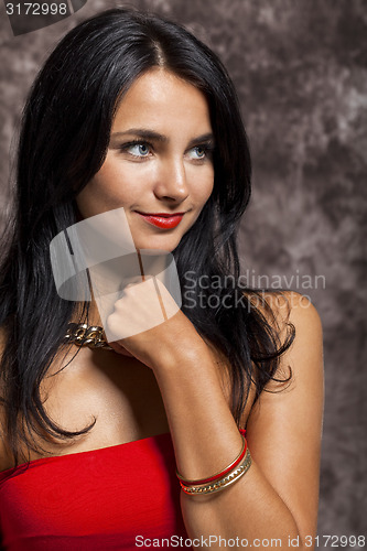 Image of Pretty Woman in Red Looking at Right Frame