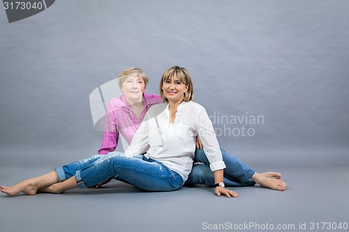 Image of Senior lady with her middle-aged daughter