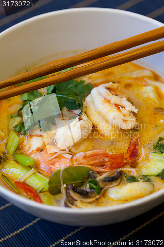 Image of Bowl of traditional Thai tom yam soup