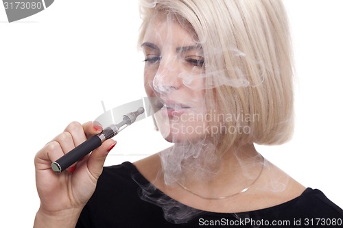 Image of Close up Blond Woman Smoking Using E- Cigarette