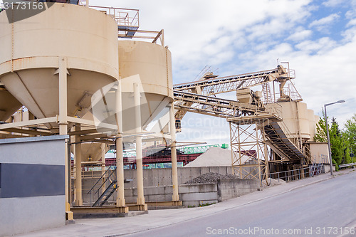 Image of Metal tanks at a refinery plant or factory