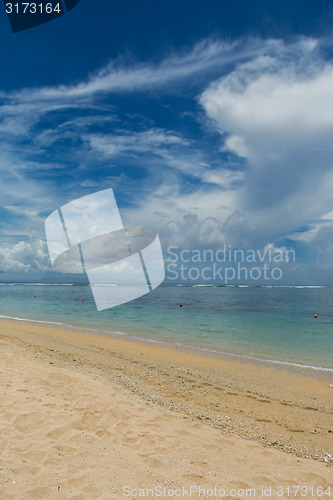 Image of Beautiful tropical beach with lush vegetation