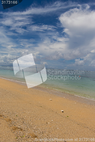 Image of Beautiful tropical beach with lush vegetation