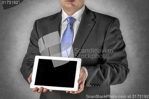 Image of Businessman with tablet computer