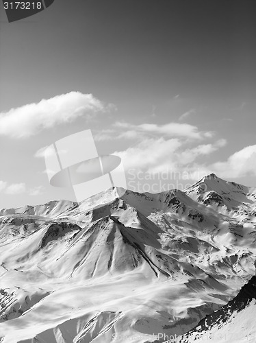 Image of Black and white snowy mountains in nice sun day