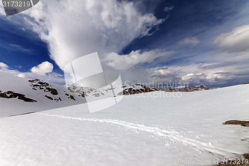 Image of Snowy mountains and sky with clouds