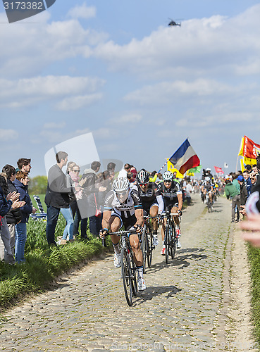 Image of Three Cyclists on Paris-Roubaix 2014