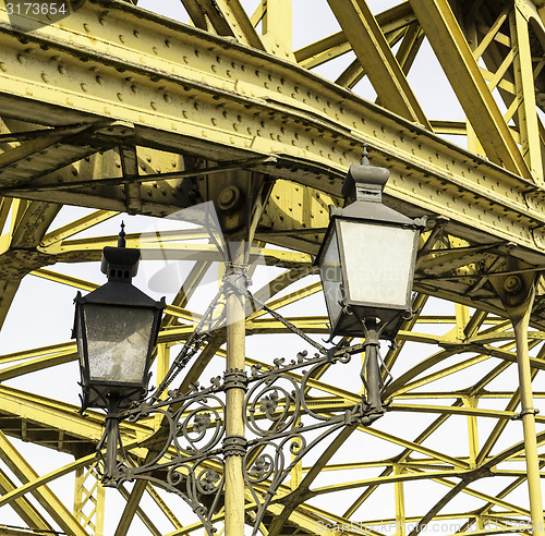 Image of Decorative lamps hanging from bridge