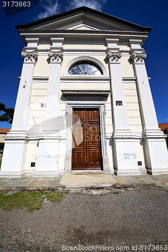 Image of  church  in  the sumirago old   closed brick  sidewalk italy  lo