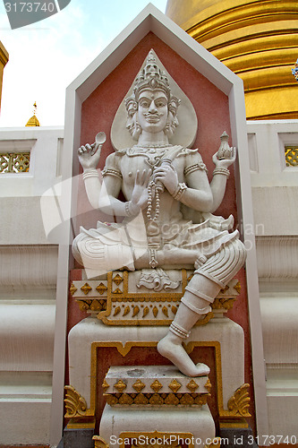 Image of siddharta   in the temple bangkok three face        step     wat