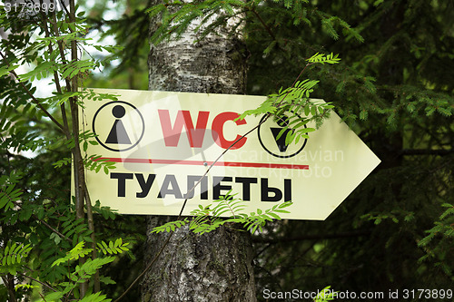 Image of Signpost. Toilets in a conservation area