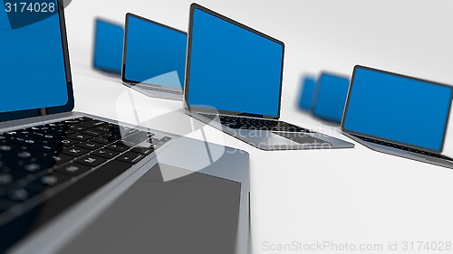 Image of laptops in a circle