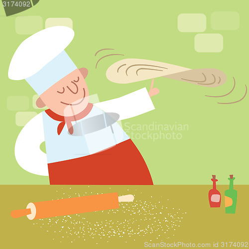 Image of restaurant cook in the kitchen cooking pizza