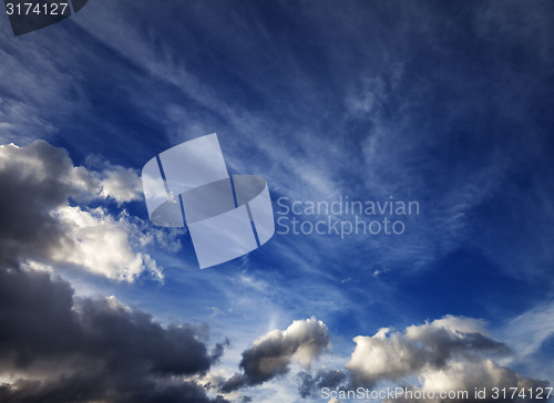 Image of Sunny sky with clouds in wind evening