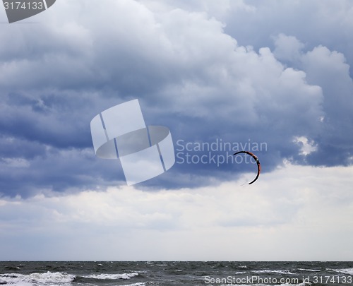 Image of Power kite in sea and cloudy sky
