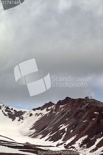 Image of Spring mountains with snow before rain