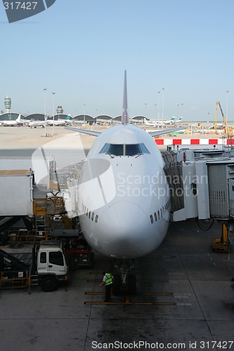 Image of Boeing 747-700 being loaded.