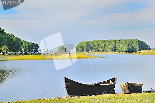 Image of boat on shore of danube river