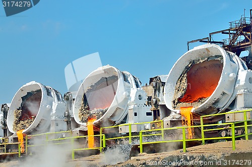 Image of Steel buckets to transport the molten metal