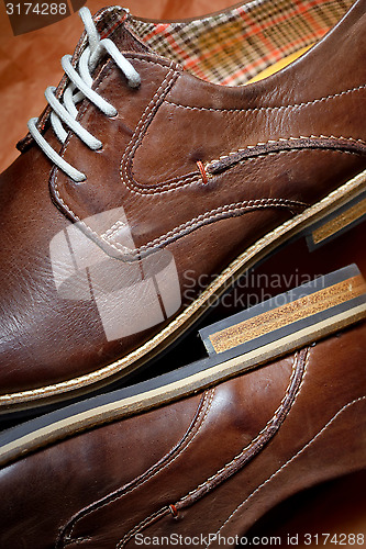 Image of Brown shoes for men