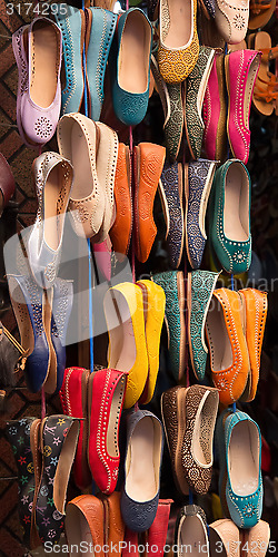 Image of Moroccan colourful leather shoes on display