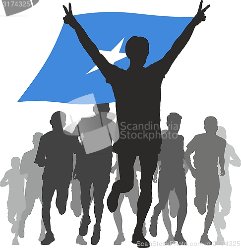 Image of Athlete with the Somalia flag at the finish