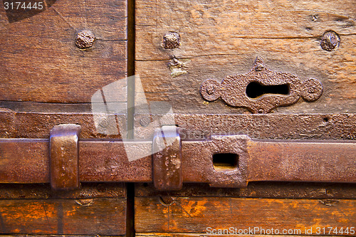 Image of and wood  door castiglione olona varese italy