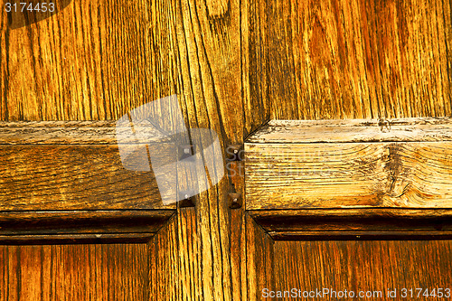 Image of brebbia abstract   rusty    door curch  closed wood italy 