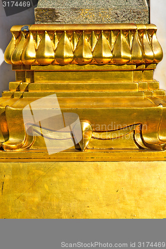 Image of  pavement gold    temple   in    column  incision of the temple 