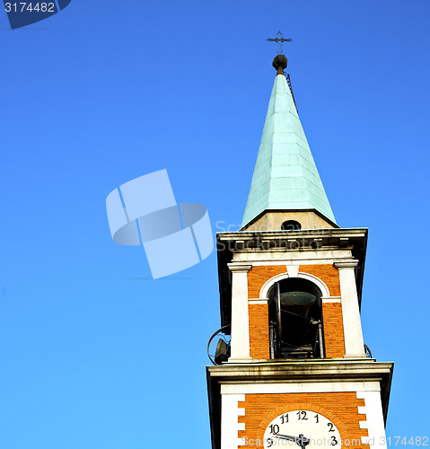 Image of olgiate    the   wall  and church  sunny day 