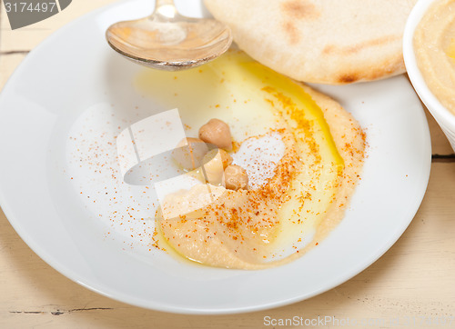 Image of Hummus with pita bread 