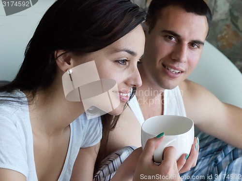 Image of couple relax and have fun in bed