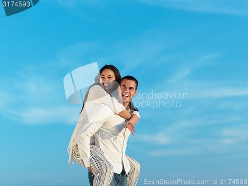 Image of happy young romantic couple have fun arelax  relax at home