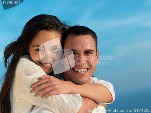 Image of happy young romantic couple have fun arelax  relax at home