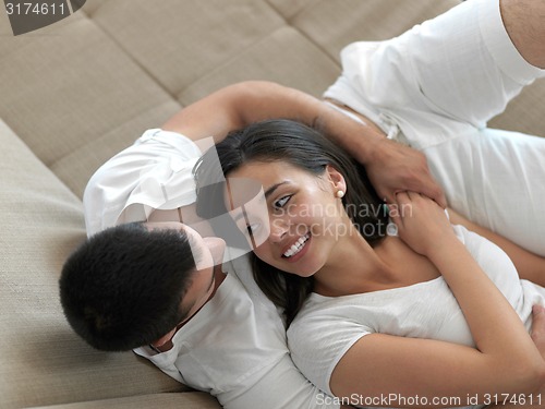 Image of relaxed young couple at home