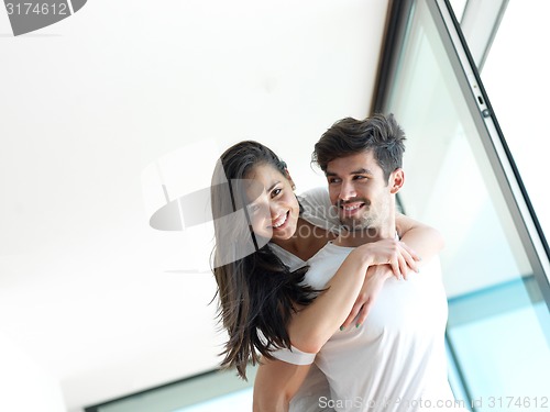 Image of relaxed young couple at home