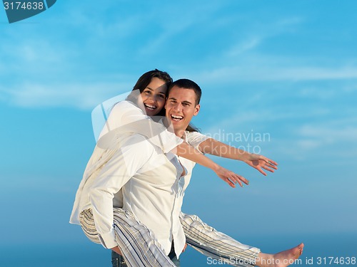 Image of happy young romantic couple have fun arelax  relax at home