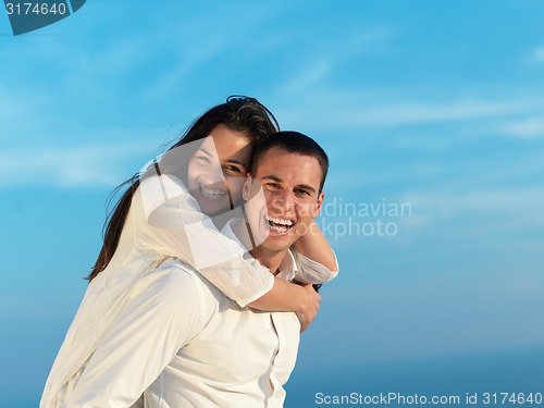Image of happy young romantic couple have fun arelax  relax at home