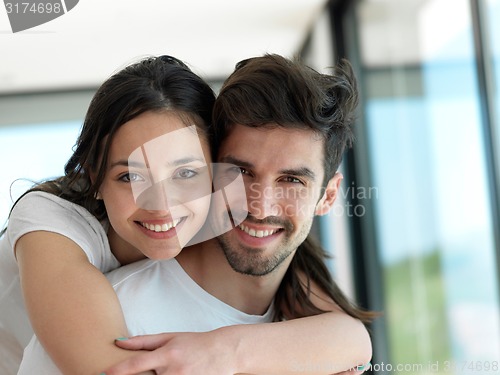 Image of relaxed young couple at home