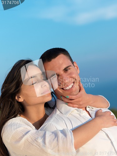 Image of happy young romantic couple have fun arelax  relax at home