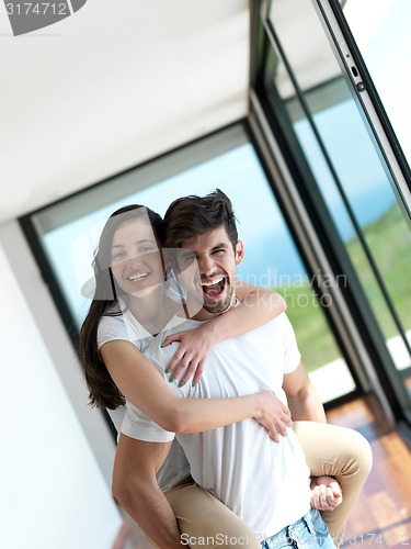 Image of relaxed young couple at home