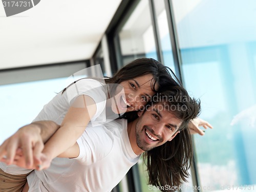 Image of relaxed young couple at home