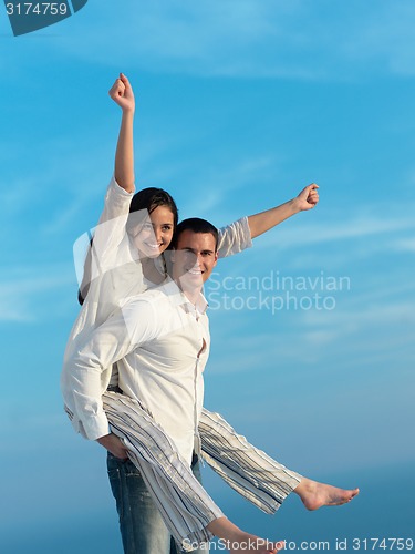 Image of happy young romantic couple have fun arelax  relax at home