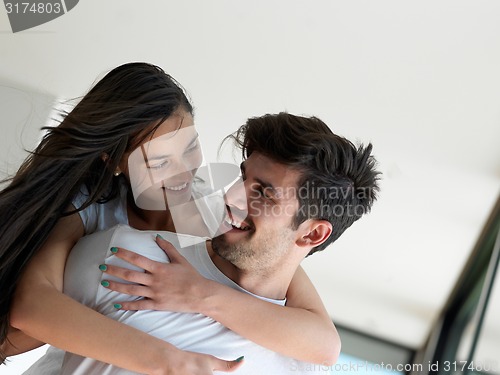 Image of relaxed young couple at home