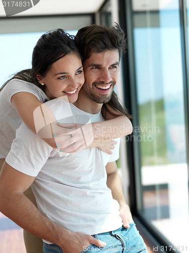 Image of relaxed young couple at home