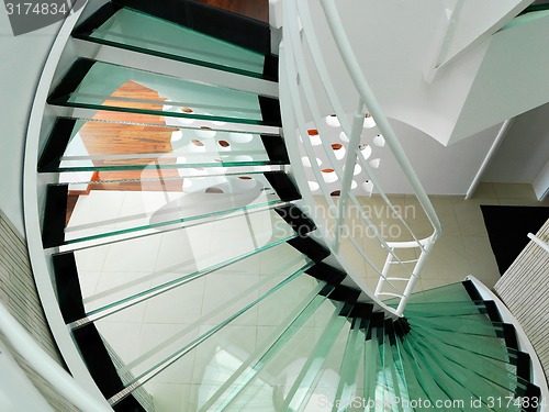 Image of modern glass spiral staircase